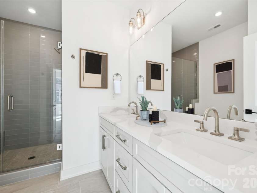 1107 Kokomo Lane, Charlotte, NC 28206.  MLS# CAR4352220, YatesRealty ID 11977. Dual Vanity Owner's Bath _ See Design Collection in photos
