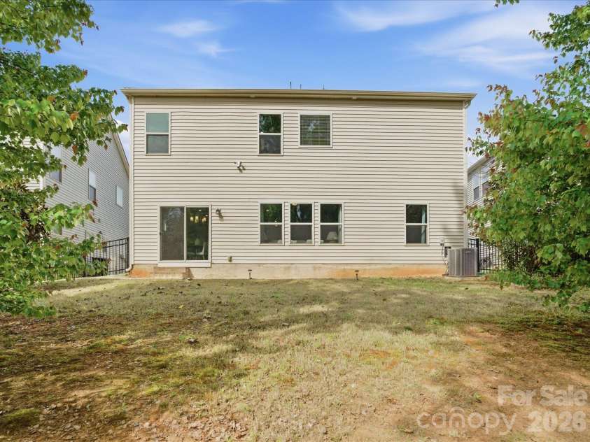 3091 Cedric Court, Fort Mill, SC 29715.  MLS# CAR4367172, YatesRealty ID 11978. View from rear yard
