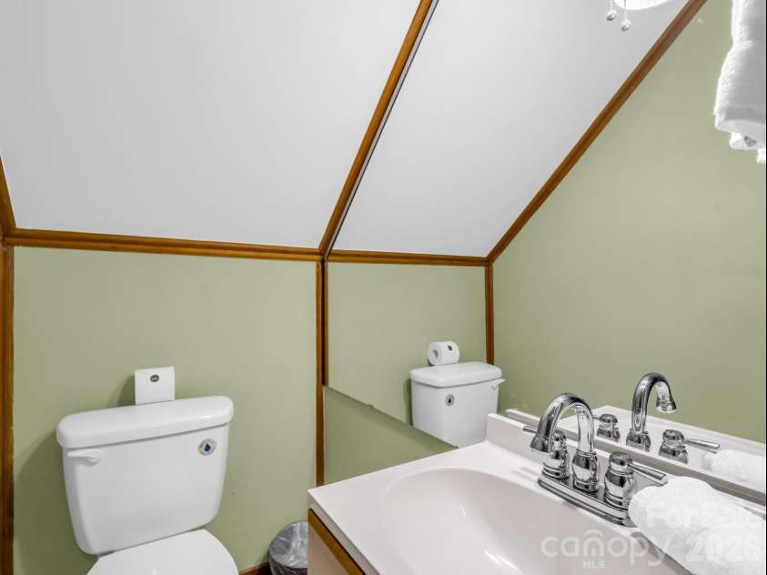 307 Watership Road, Lake Lure, NC 28746.  MLS# CAR4363993, YatesRealty ID 11982. Lower Level half bath
