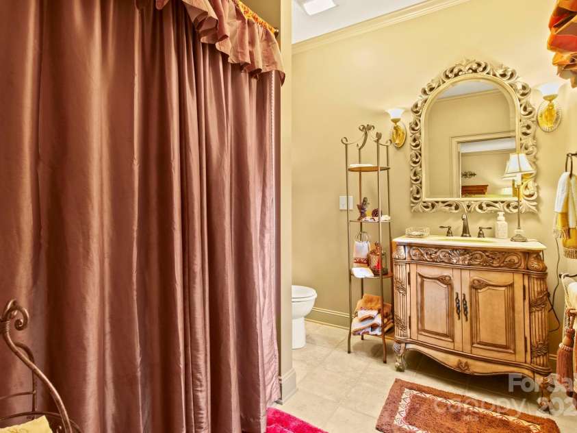 285 Wetherley None, Boone, NC 28607.  MLS# CAR4247849, YatesRealty ID 1199. Lower level bedroom suite 1