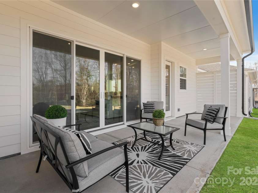 1132 Meander Lane, Waxhaw, NC 28173.  MLS# CAR4238034, YatesRealty ID 11995. Covered Back Patio with 