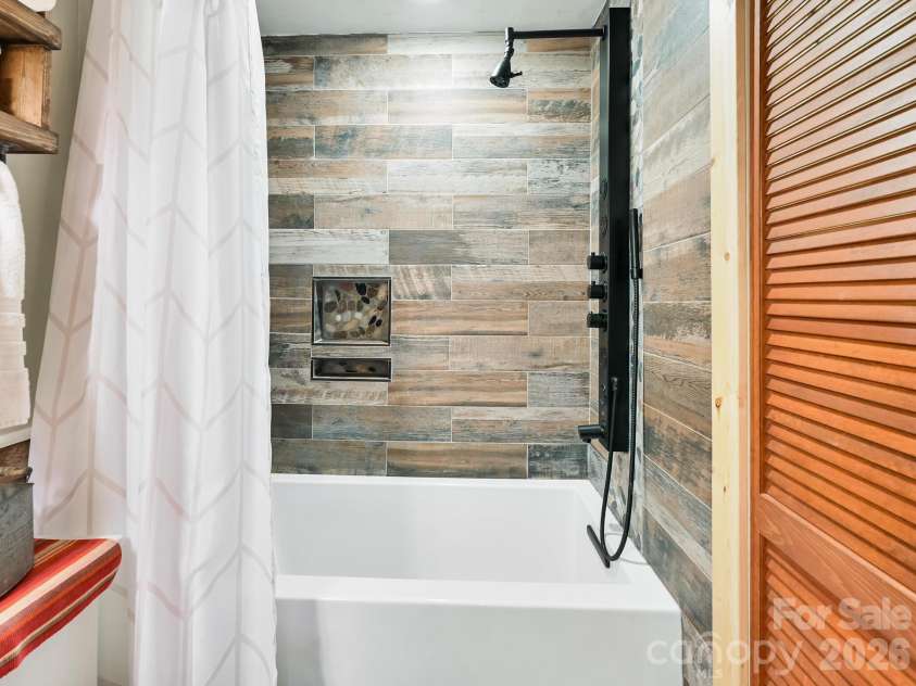 1954 Utah Mountain Road, Waynesville, NC 28785.  MLS# CAR4336522, YatesRealty ID 11998. Soak for Awhile...