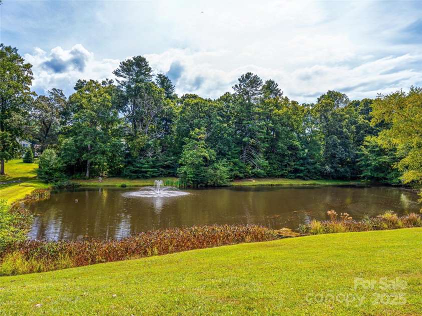 83 Farm Lane, Mills River, NC 28759.  MLS# CAR4303324, YatesRealty ID 12. Community pond