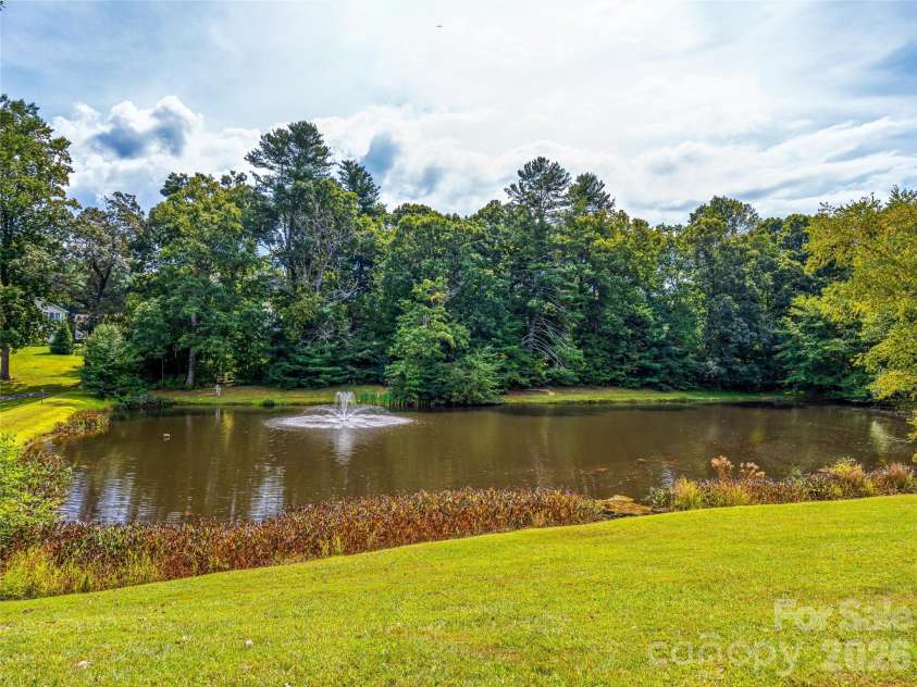 83 Farm Lane, Mills River, NC 28759.  MLS# CAR4303324, YatesRealty ID 12. Community pond