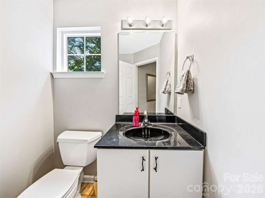 83 Farm Lane, Mills River, NC 28759.  MLS# CAR4303324, YatesRealty ID 12. Main level 1/2 bath