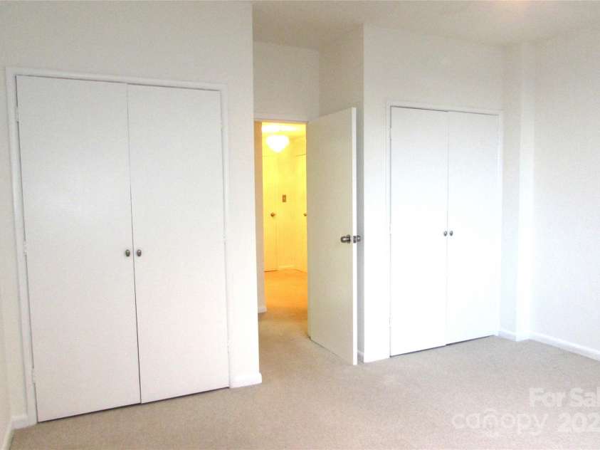 1300 Reece Road, Charlotte, NC 28209.  MLS# CAR4185948, YatesRealty ID 1200. BR has a closet on either side of entry