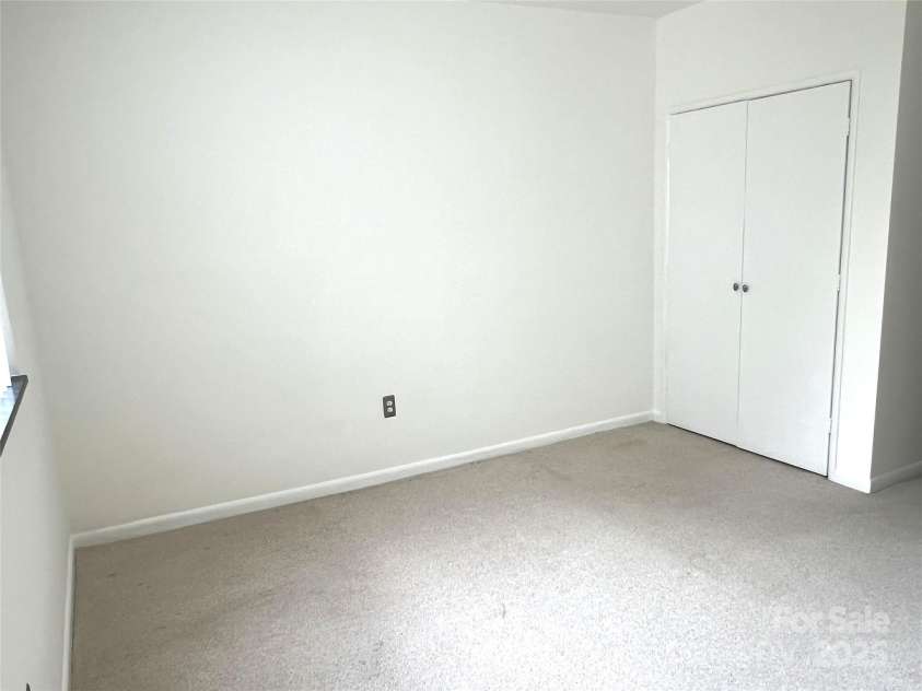 1300 Reece Road, Charlotte, NC 28209.  MLS# CAR4185948, YatesRealty ID 1200. BR showing 1 of 2 closets