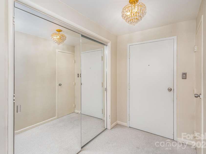 1300 Reece Road, Charlotte, NC 28209.  MLS# CAR4185948, YatesRealty ID 1200. Entrance way has 3 closets