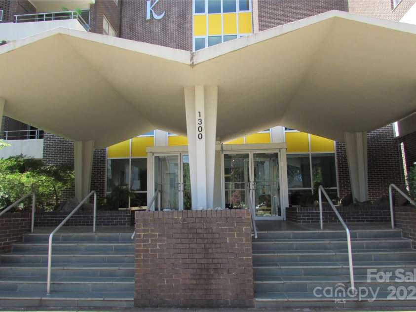 1300 Reece Road, Charlotte, NC 28209.  MLS# CAR4185948, YatesRealty ID 1200. Front entrance - 1300 Reece Road - The Kimberlee