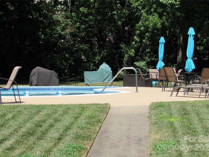 1300 Reece Road, Charlotte, NC 28209.  MLS# CAR4185948, YatesRealty ID 1200. Inground pool