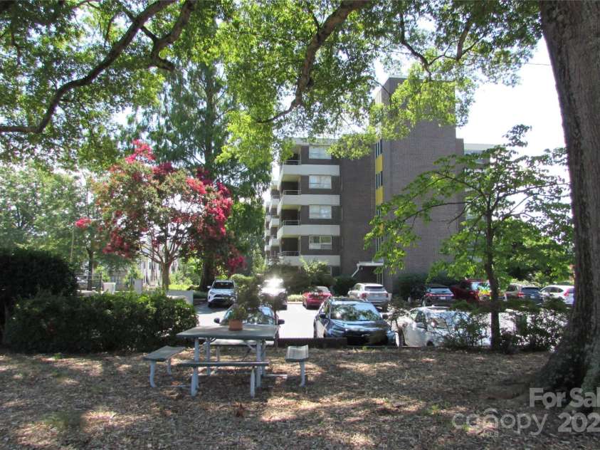 1300 Reece Road, Charlotte, NC 28209.  MLS# CAR4185948, YatesRealty ID 1200. Right side view of the Kimberlee