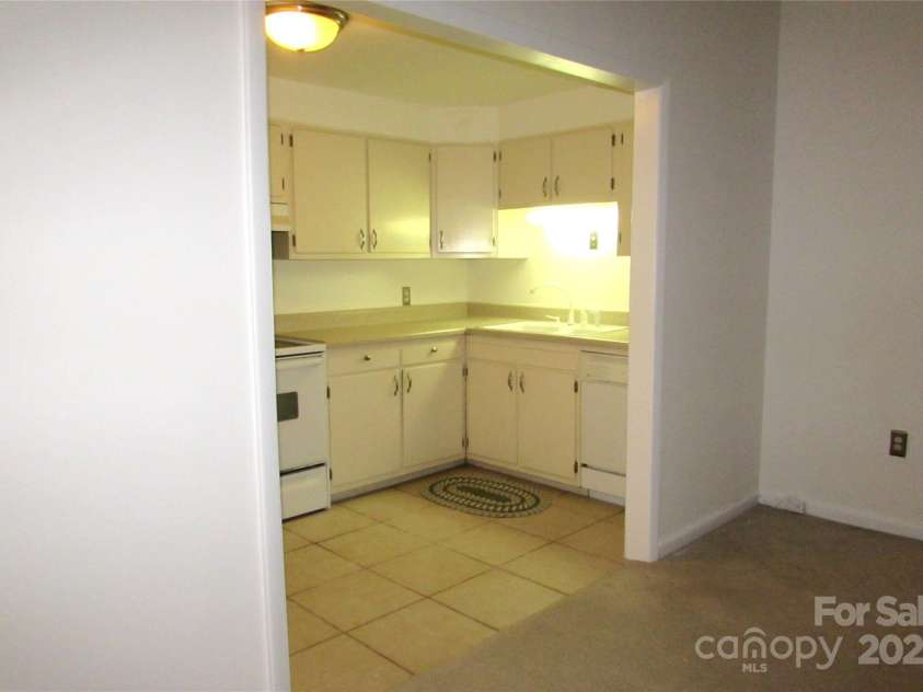 1300 Reece Road, Charlotte, NC 28209.  MLS# CAR4185948, YatesRealty ID 1200. View inside kitchen