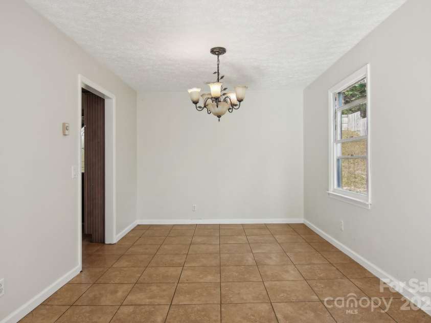 821 Anne Avenue, Hendersonville, NC 28739.  MLS# CAR4197377, YatesRealty ID 12006. Dining room