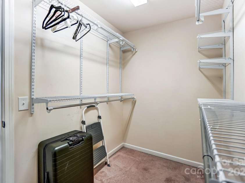 4224 Park South Station Boulevard, Charlotte, NC 28210.  MLS# CAR4227871, YatesRealty ID 12007. Primary Bedroom walk-in closet