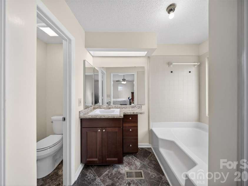 2354 Castlecomer Drive, Charlotte, NC 28262.  MLS# CAR4349198, YatesRealty ID 12008. Primary bathroom