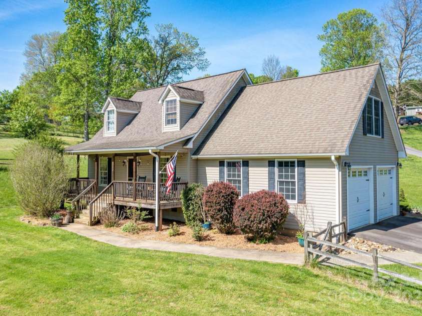 122 Ramsey Road, Asheville, NC 28806.  MLS# CAR4233927, YatesRealty ID 12010. Attached large two-car garage,  perfect for a car enthusiast or shop space