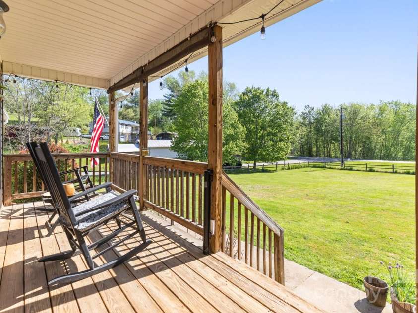 122 Ramsey Road, Asheville, NC 28806.  MLS# CAR4233927, YatesRealty ID 12010. Welcoming front porch with expansive views