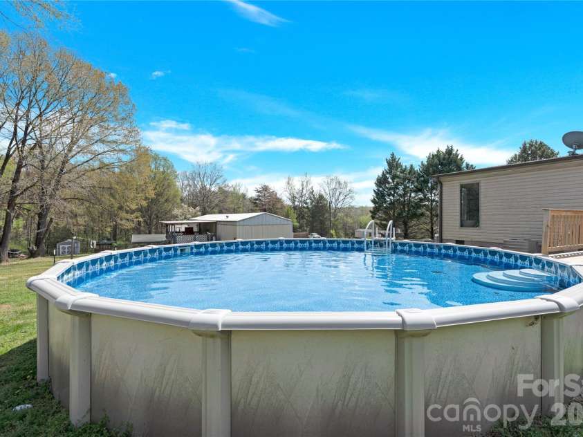 3770 Macklin Street, Claremont, NC 28610.  MLS# CAR4365332, YatesRealty ID 12010. Above ground pool