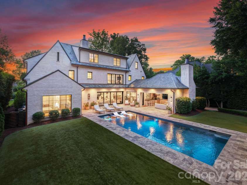 1919 Shoreham Drive, Charlotte, NC 28211.  MLS# CAR4387654, YatesRealty ID 12012. Elevated backyard view at twilight.