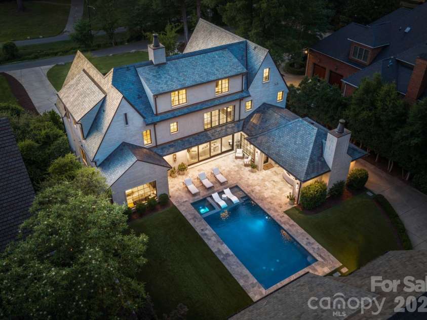 1919 Shoreham Drive, Charlotte, NC 28211.  MLS# CAR4387654, YatesRealty ID 12012. Elevated backyard view at twilight.