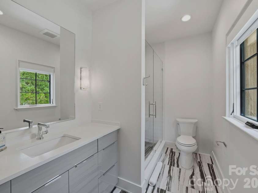 1919 Shoreham Drive, Charlotte, NC 28211.  MLS# CAR4387654, YatesRealty ID 12012. Guest bathroom.