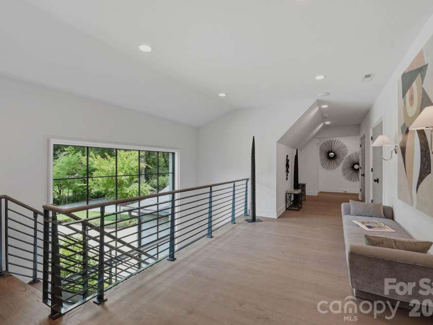 1919 Shoreham Drive, Charlotte, NC 28211.  MLS# CAR4387654, YatesRealty ID 12012. Upper level landing.