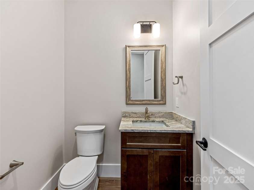 435 Barrington Drive, Asheville, NC 28803.  MLS# CAR4235274, YatesRealty ID 12013. Main level half bath