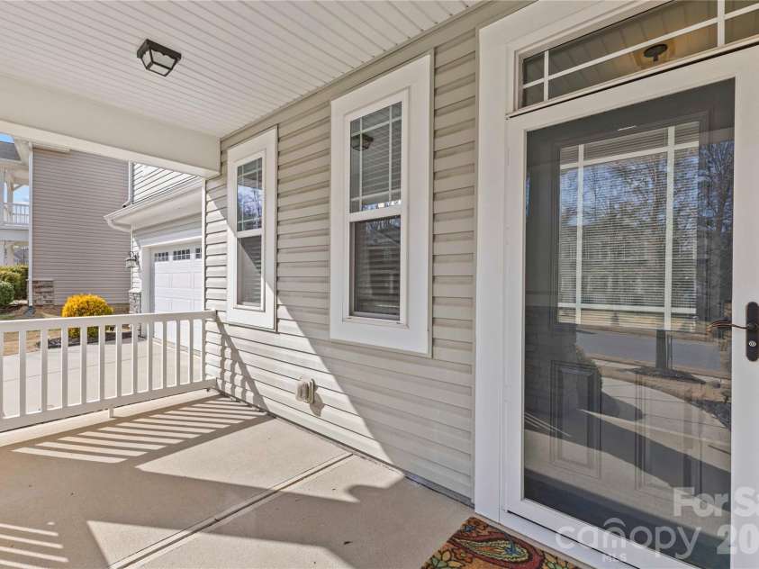 7512 Meridale Forest Drive, Charlotte, NC 28269.  MLS# CAR4346569, YatesRealty ID 12014. Inviting Front Porch