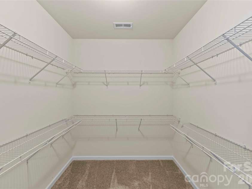 7512 Meridale Forest Drive, Charlotte, NC 28269.  MLS# CAR4346569, YatesRealty ID 12014. Large Walk-in Closet