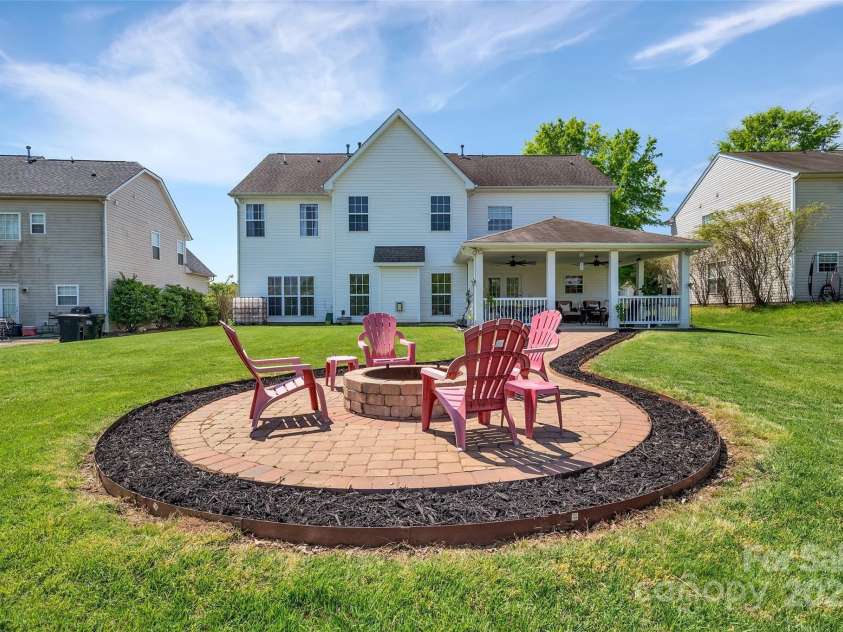 5412 Fulton Ridge Drive, Indian Trail, NC 28079.  MLS# CAR4237895, YatesRealty ID 12017. Enjoy cozy conversations around the fire pit area.