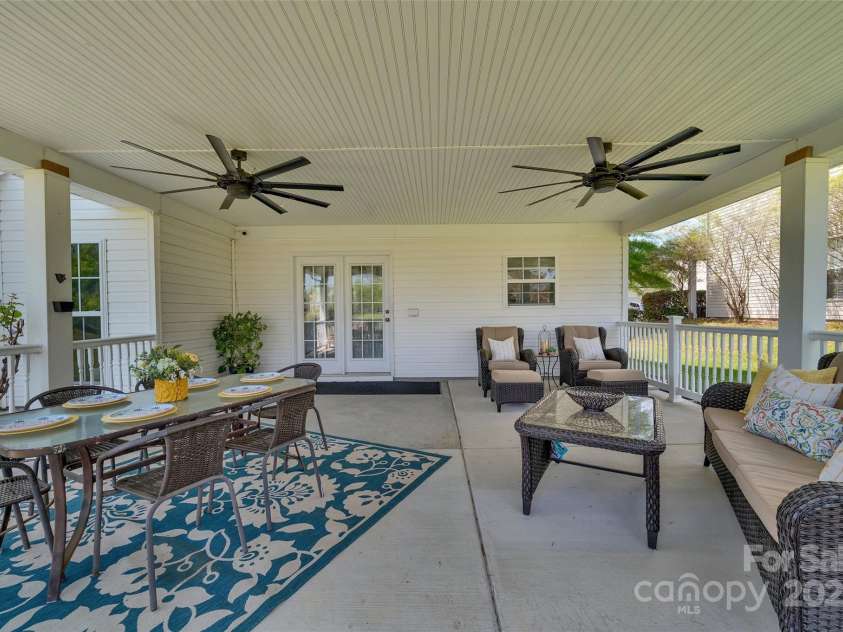 5412 Fulton Ridge Drive, Indian Trail, NC 28079.  MLS# CAR4237895, YatesRealty ID 12017. Enjoy outdoor living at its finest with this covered patio area.
