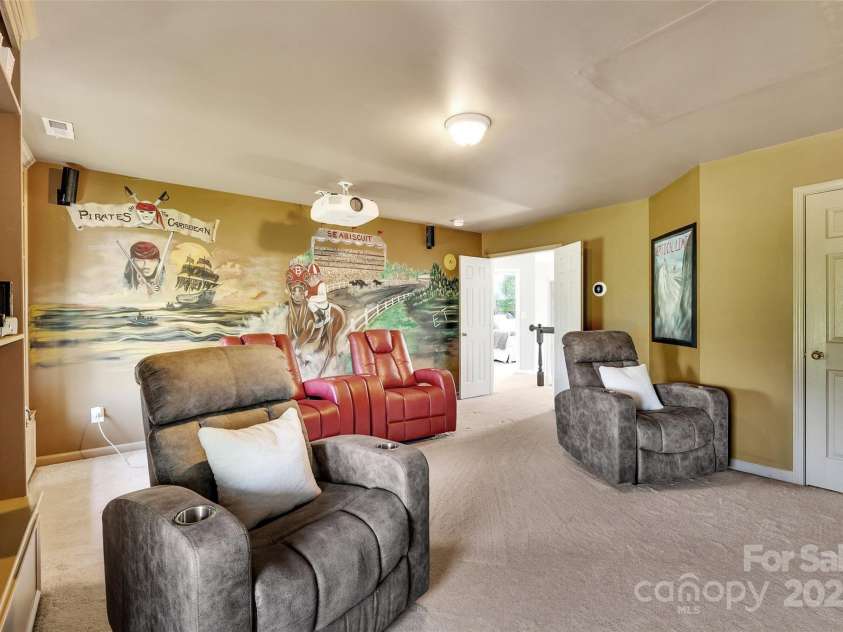 5412 Fulton Ridge Drive, Indian Trail, NC 28079.  MLS# CAR4237895, YatesRealty ID 12017. Large media room has built ins and a closet for storage.