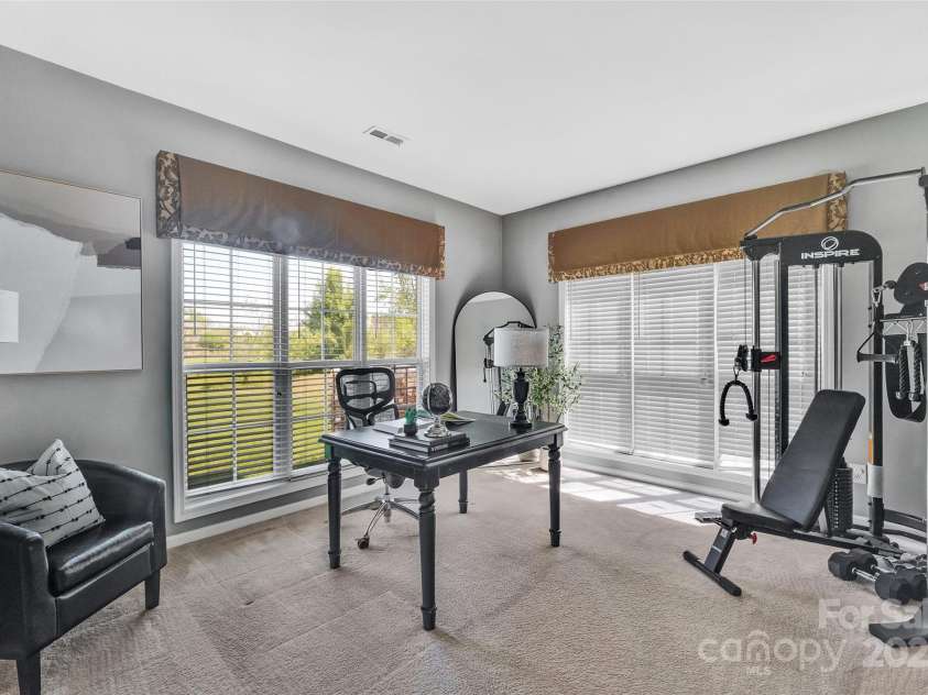 5412 Fulton Ridge Drive, Indian Trail, NC 28079.  MLS# CAR4237895, YatesRealty ID 12017. Perfect space for an office, gym or flex area on main.