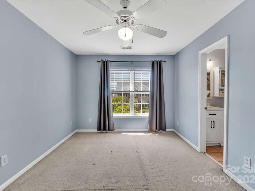 5412 Fulton Ridge Drive, Indian Trail, NC 28079.  MLS# CAR4237895, YatesRealty ID 12017. Spacious bedroom has full bath.