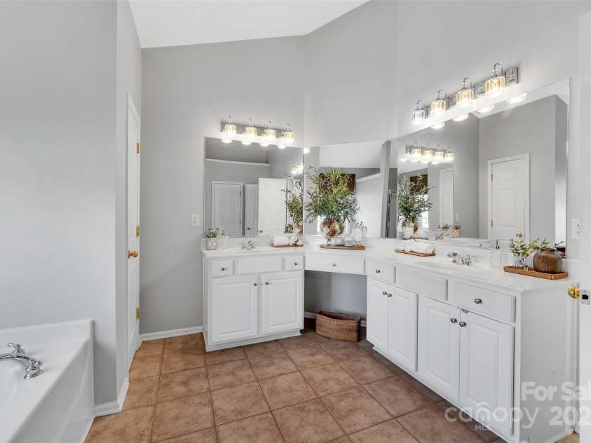 5412 Fulton Ridge Drive, Indian Trail, NC 28079.  MLS# CAR4237895, YatesRealty ID 12017. Spacious primary bath has separate sinks and vanity area.