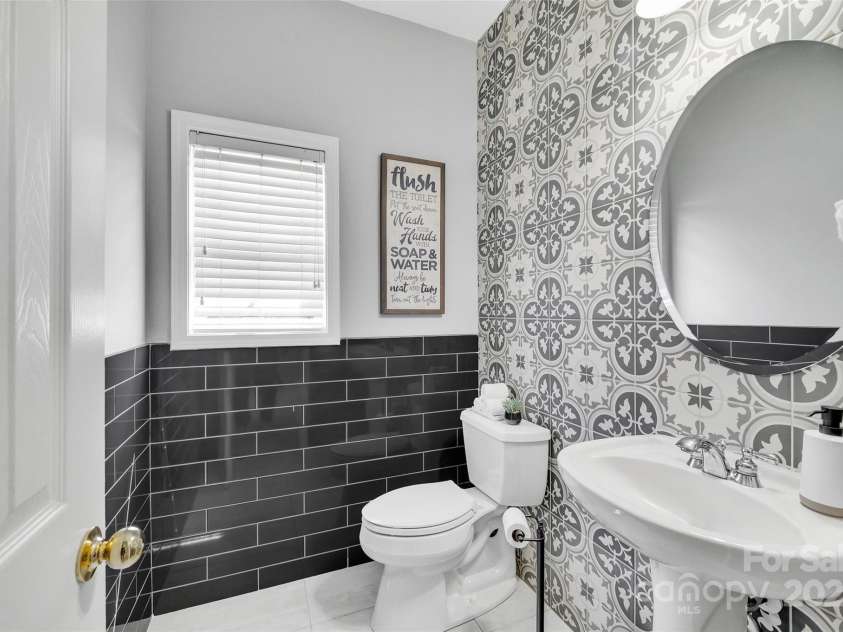 5412 Fulton Ridge Drive, Indian Trail, NC 28079.  MLS# CAR4237895, YatesRealty ID 12017. Updated powder room on the main with brush nickel finishes.