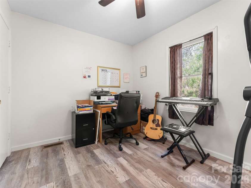 585 Peak Street, Columbus, NC 28722.  MLS# CAR4365398, YatesRealty ID 12017. Back simple and functional bedroom