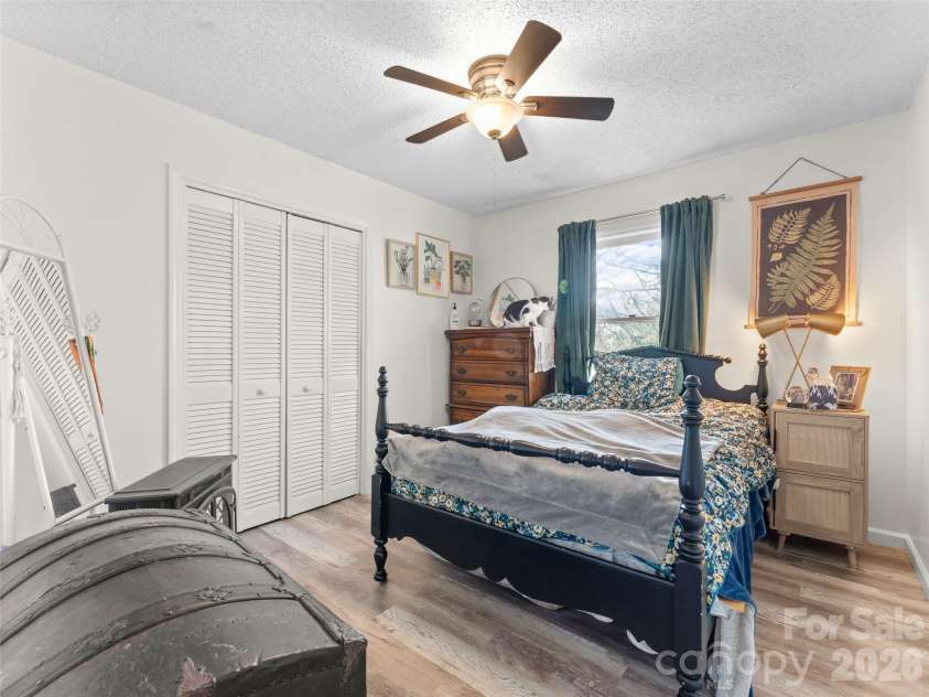 585 Peak Street, Columbus, NC 28722.  MLS# CAR4365398, YatesRealty ID 12017. Front bright bedroom with a clean layout