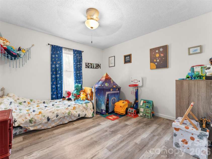585 Peak Street, Columbus, NC 28722.  MLS# CAR4365398, YatesRealty ID 12017. Front simple and functional bedroom