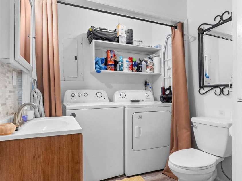 585 Peak Street, Columbus, NC 28722.  MLS# CAR4365398, YatesRealty ID 12017. Functional half bath combined with laundry space