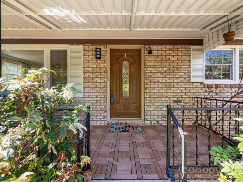 12 Deerwood Drive, Asheville, NC 28805.  MLS# CAR4253736, YatesRealty ID 12018. Covered Front Porch