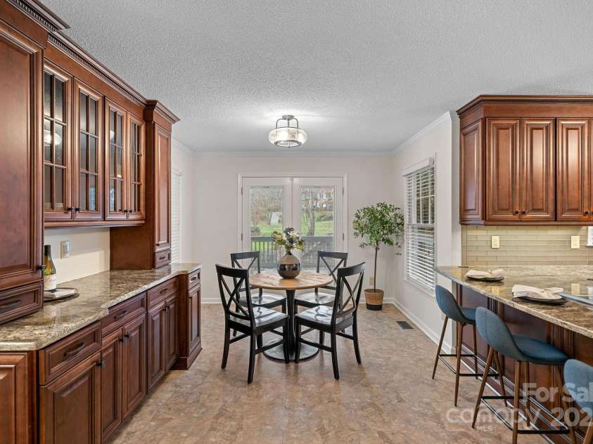 2730 Tiffany Drive, Rock Hill, SC 29732.  MLS# CAR4327115, YatesRealty ID 12020. Great breakfast area with built in cabinets.