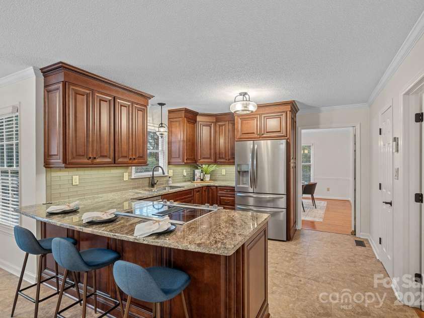 2730 Tiffany Drive, Rock Hill, SC 29732.  MLS# CAR4327115, YatesRealty ID 12020. Updated light fixtures and under cabinet lighting.