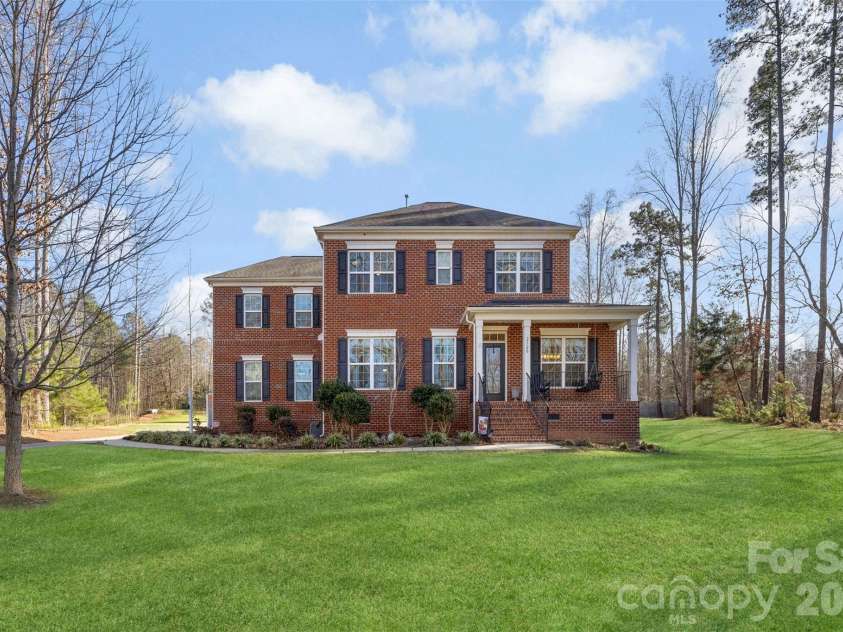 2720 Lakefront Drive, Belmont, NC 28012.  MLS# CAR4335195, YatesRealty ID 12022. Grass is enhanced