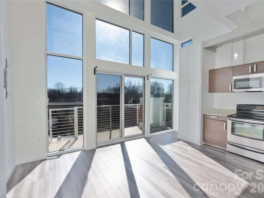 3123 Davidson Street, Charlotte, NC 28205.  MLS# CAR4341241, YatesRealty ID 12024. Second Level: Kitchen Living Space Balcony