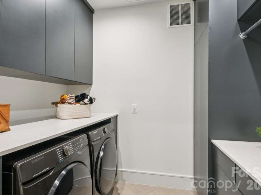 2103 Cortelyou Road, Charlotte, NC 28211.  MLS# CAR4363089, YatesRealty ID 12025. Upper level Laundry 
