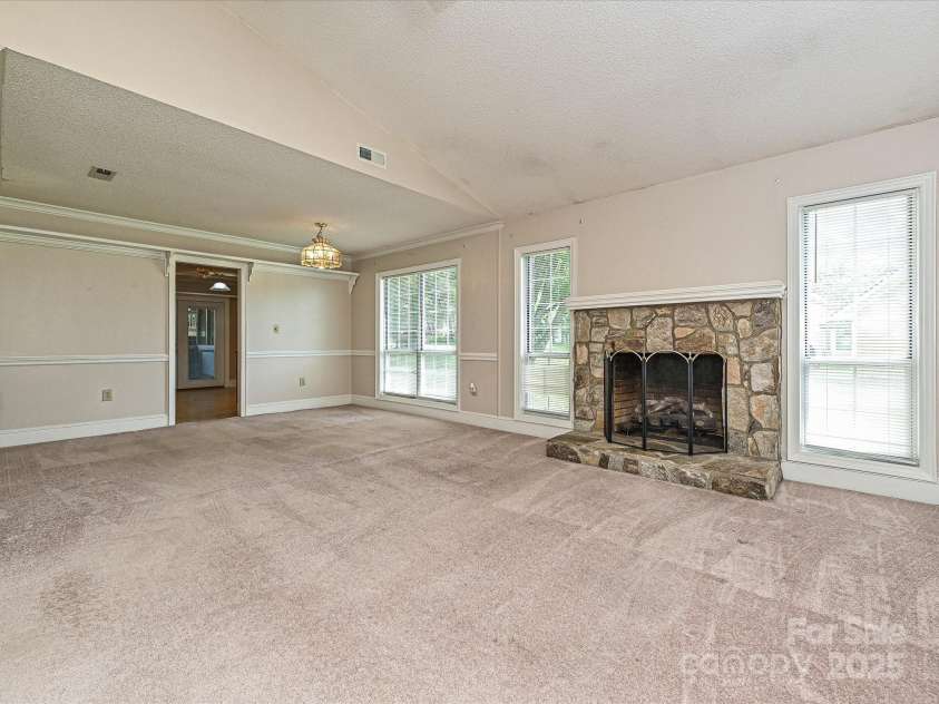 2919 Peachwood Court, Fort Mill, SC 29715.  MLS# CAR4254130, YatesRealty ID 12026. Living Room and Dining Area