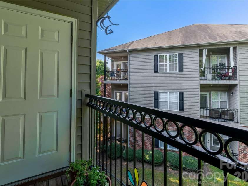 332 Appeldoorn Circle, Asheville, NC 28803.  MLS# CAR4279509, YatesRealty ID 12027. Balcony and storage access door