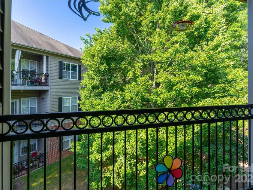 332 Appeldoorn Circle, Asheville, NC 28803.  MLS# CAR4279509, YatesRealty ID 12027. Covered balcony