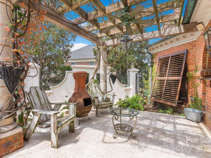 4465 3rd Street, Hickory, NC 28601.  MLS# CAR4247414, YatesRealty ID 12028. Tangerine vines on Arbor